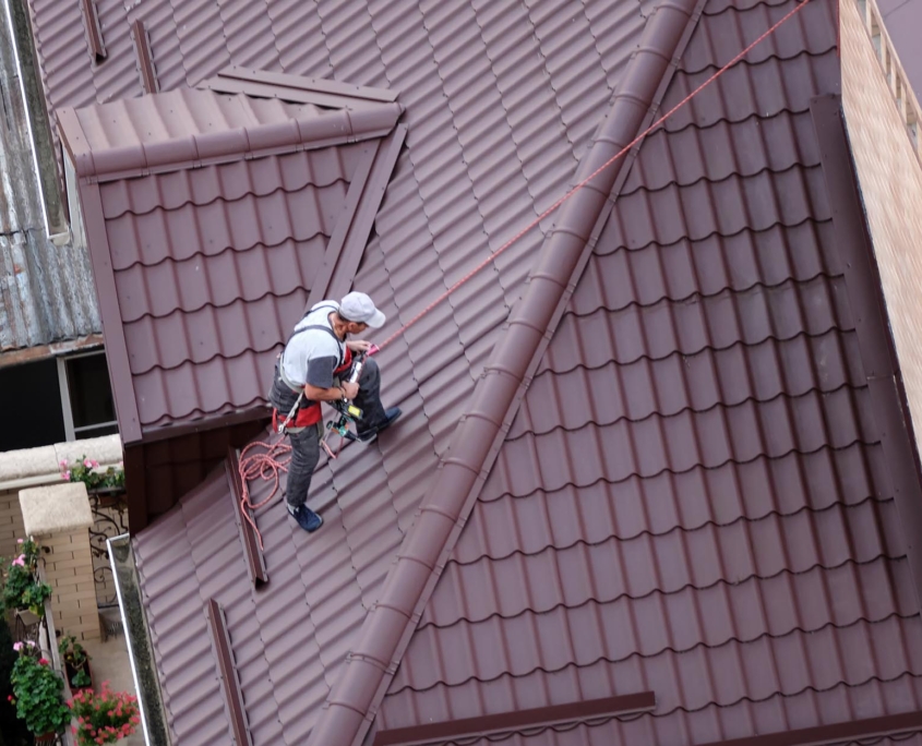 Roofing Construction A Man On A Roof in San Antonio Texas