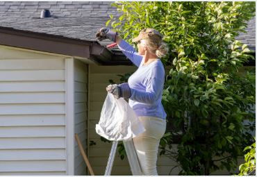Spring maintenance home flood prevention gutter cleaning San Antonio