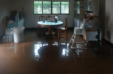 Water damage restoration Cibolo Texas flooded home interior requiring immediate professional cleanup