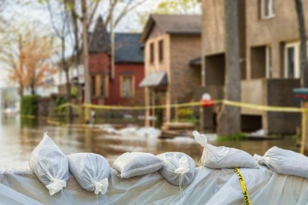 Water damage restoration Selma TX | Selma Texas flood damage restoration showing storm water cleanup in residential area