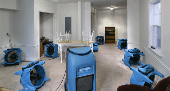 Water damage restoration Timberwood Park TX -Professional equipment being used in home