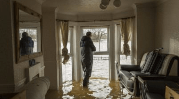 Water damage restoration Hondo Texas flooded home interior Prime Time services