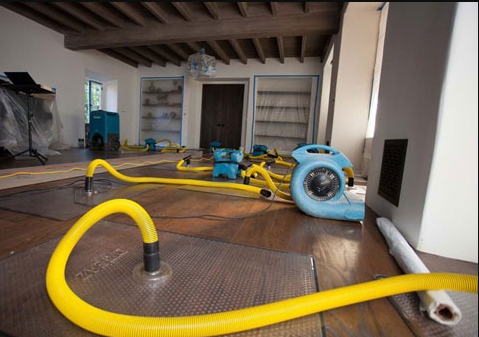 water damage restoration Houston Texas flooded commercial building emergency services Prime Time Water Damage