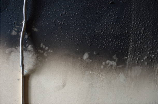 Smoke and soot damage requiring fire damage restoration in Kyle showing wall deterioration