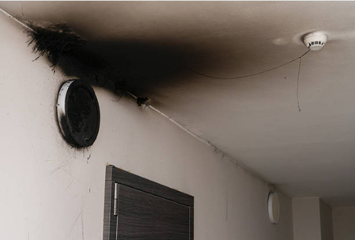 Smoke and soot damage requiring fire damage restoration in Kyle showing wall deterioration
