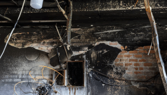 Fire damage restoration in San Antonio showing extensive property damage requiring professional restoration services