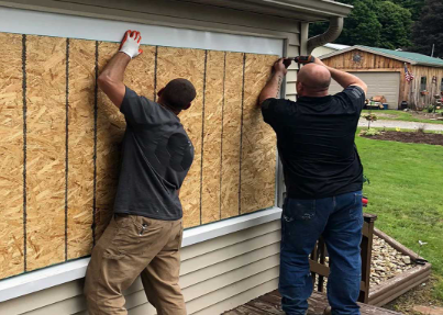 Emergency fire damage restoration in San Antonio team providing immediate property stabilization and security services