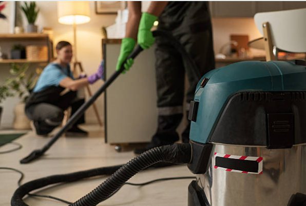 Water Damage and Restoration: The Essential 7-Step Process Every Property Owner in San Antonio Must Know 3 water damage and restoration technician extracting floodwater using industrial equipment