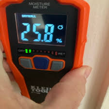 Why 24/7 Restoration Services Matter When Disaster Strikes Your Home or Business 2 24/7 restoration technician using moisture meter on water-damaged drywall in San Antonio